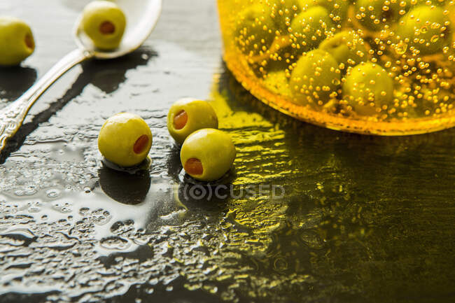 Green olives stuffed with peppers — Stock Photo