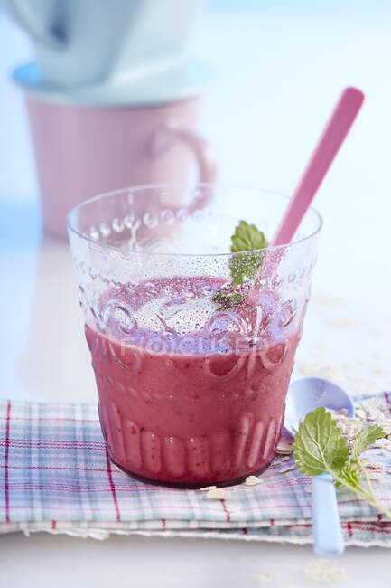 Breakfast smoothie with berries, vanilla, lemon, rice drink, yoghurt and lemon balm — Stock Photo