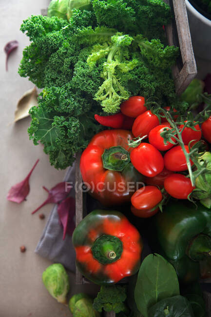 Fresh vegetables on a wooden background — Stock Photo
