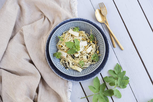 Pasta with white asparagus and ground-elder — Stock Photo