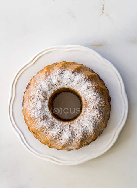 Marble cake with powdered sugar top view — Stock Photo