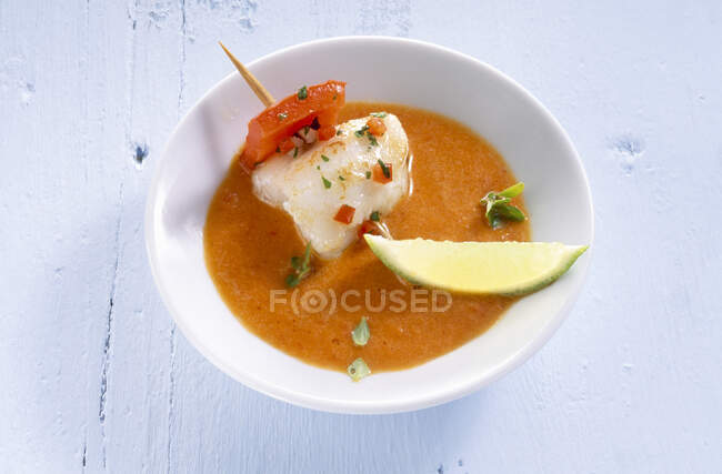 Fried spicy marinated monkfish skewer in pepper sauce — Stock Photo