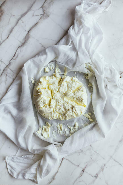 Labneh in cheese cloth — Stock Photo