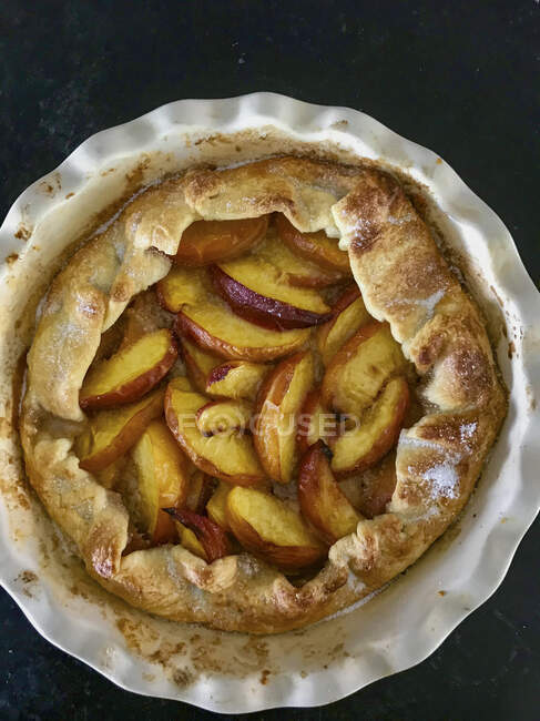 Open peach pie top view — Stock Photo