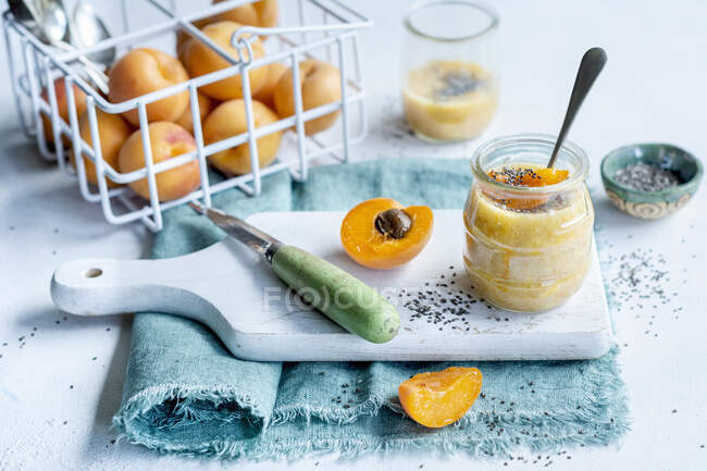 Apricot dessert with chia seeds in jar — Stock Photo