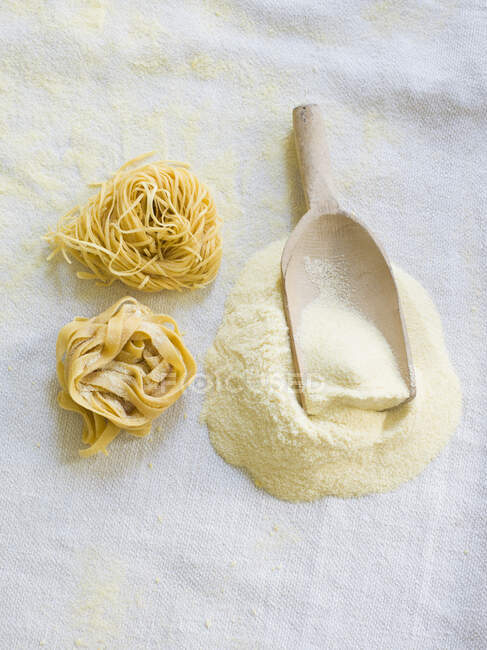 Homemade pasta and semolina — Stock Photo