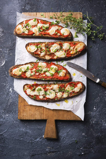 Baked toasted smoked flour bread with Ajvar (paprika paste) and vegan almond cheese — Stock Photo