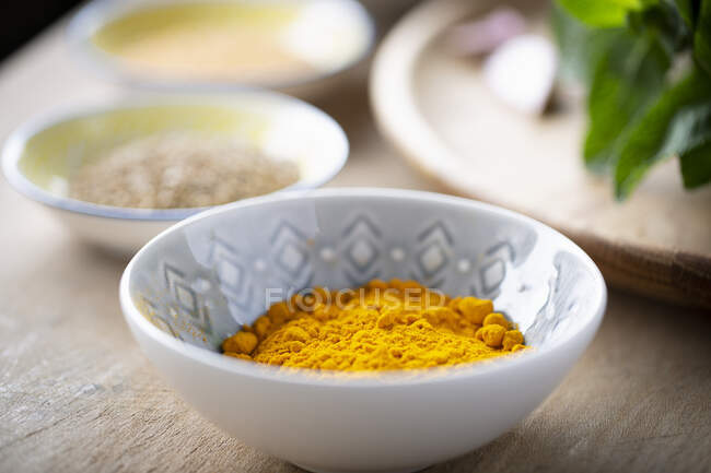 A bowl of turmeric powder — Stock Photo