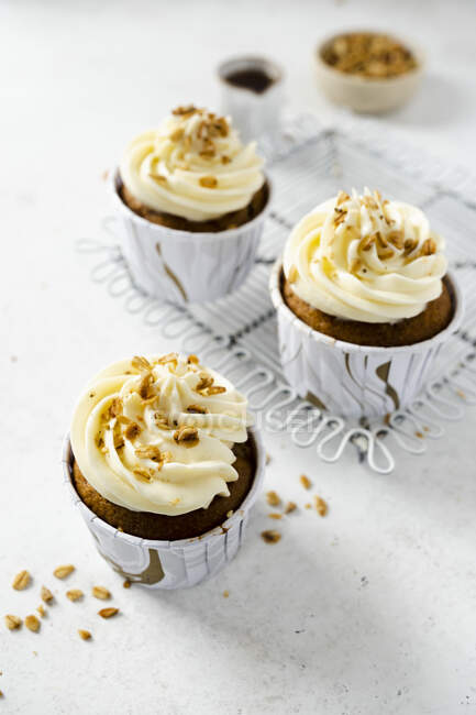 Apple hazelnut muffins sweetened with honey and tagatose with frosting — Stock Photo