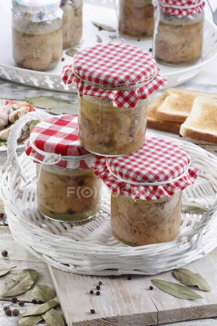 Canned homemade chicken in a jar — Stock Photo