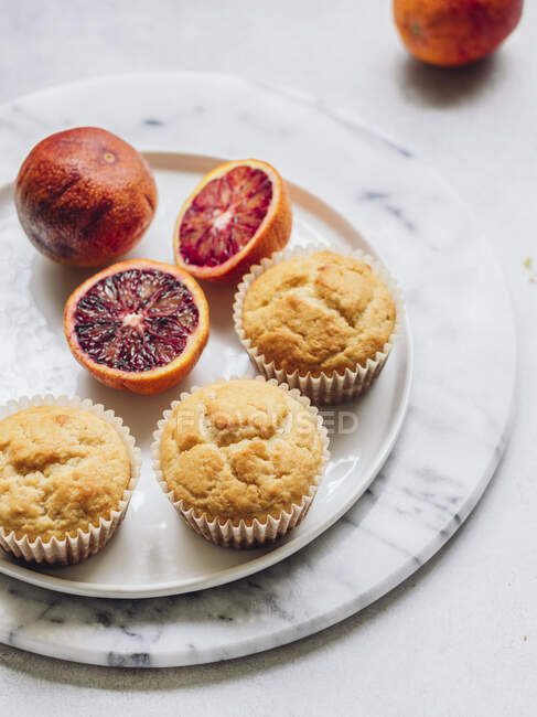 Blood orange muffins with raisins — Stock Photo