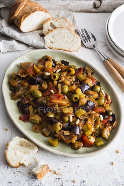 Baked eggplant with mushrooms, tomato and onion — Stock Photo