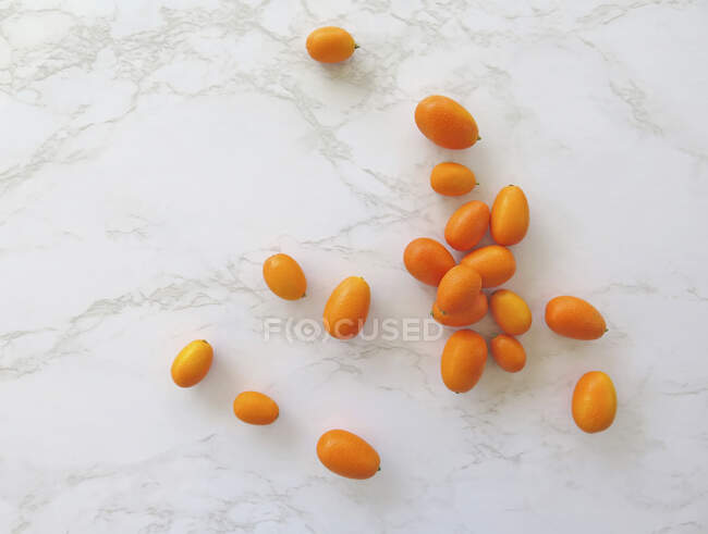 Fresh ripe apricots on white background — Stock Photo