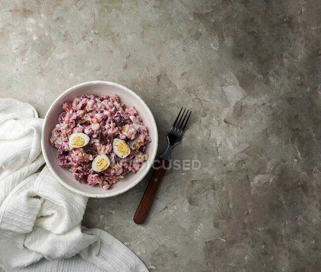 Rosolli - Finnish beetroot herring salad for Christmas and New Year — Stock Photo