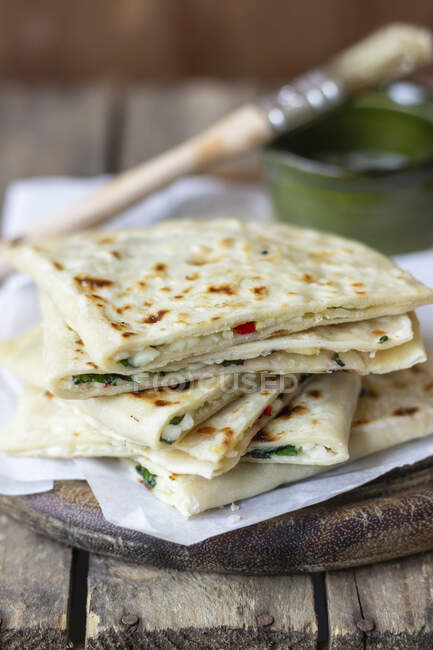 Gozleme with halloumi cheese, parley and chilli, melter butter — Stock Photo