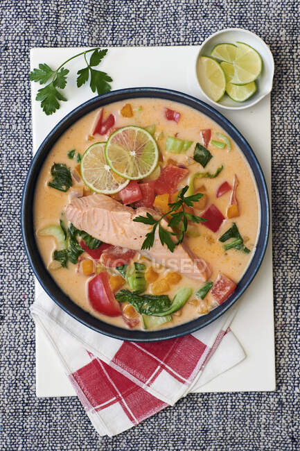 Close-up shot of delicious Salmon Coconut and Butternut Laska — Stock Photo