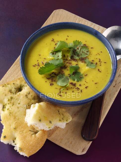 Parsnip soup in blue bowl — Stock Photo