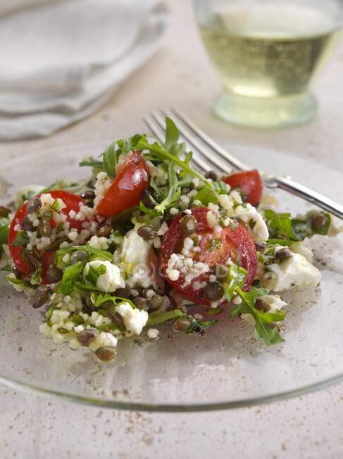 Salad with feta cheese couscous and lentils — Stock Photo