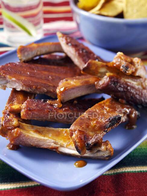 A plate of barbecued pork spare ribs — Stock Photo