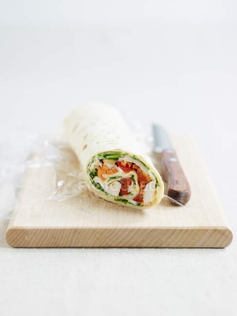 A chicken wrap with vegetables — Stock Photo