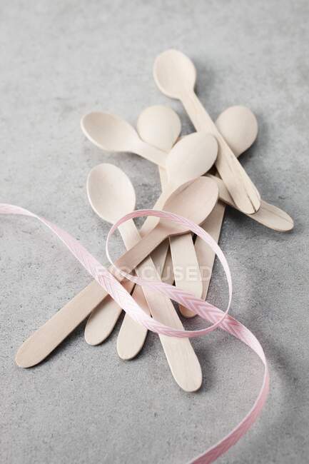 Small wooden spoons close-up view — Stock Photo