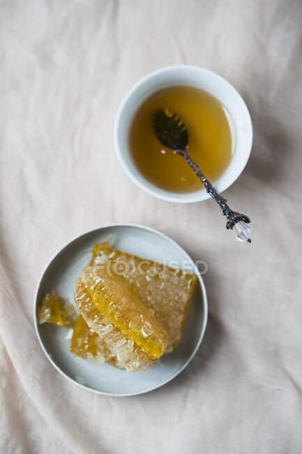 Honey on a honeycomb close-up view — Stock Photo