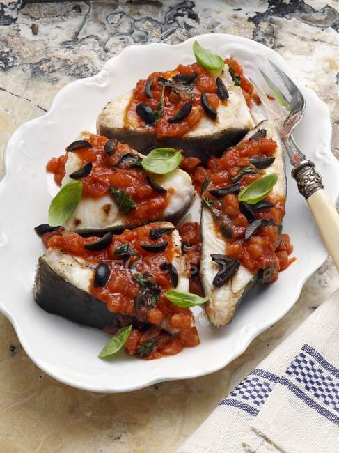 Halibut on a serving dish — Stock Photo