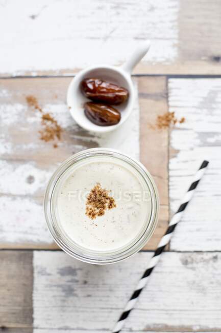 Cashew milk with dates close-up view — Stock Photo