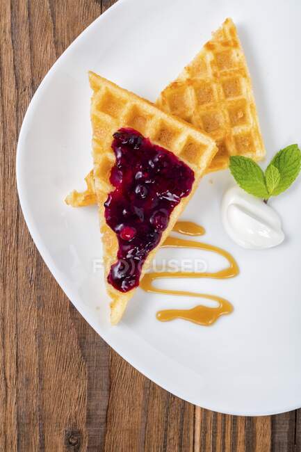 Waffles with berry jam (top view) — Stock Photo