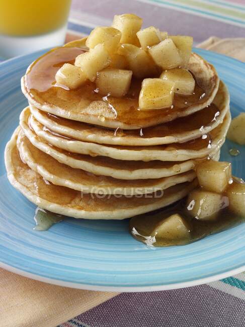 Stack of pancakes with honey — Stock Photo