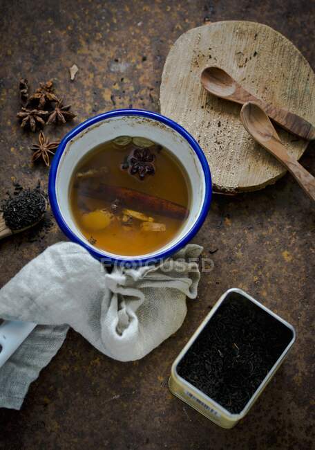 A cup of chai with spices — Stock Photo