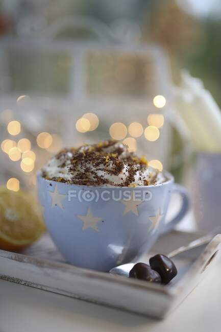 Hot chocolate with whipped cream and orange flavor — Stock Photo