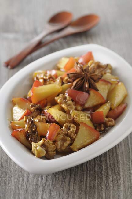 Apple compote with star anise and walnuts — Stock Photo