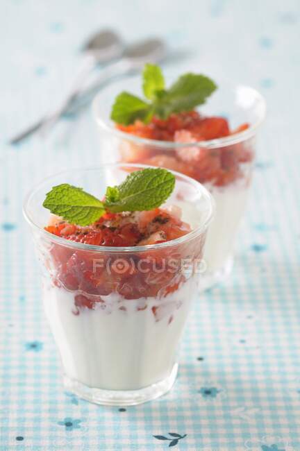 Panacotta with strawberries close-up view — Stock Photo