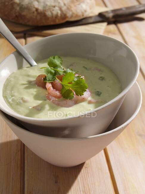 Cucumber avocado and prawn soup — Stock Photo