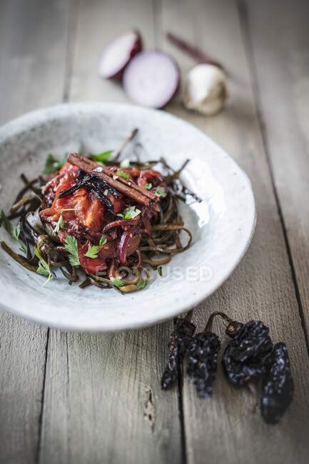 Seaweed pasta with smoked chilli — Stock Photo