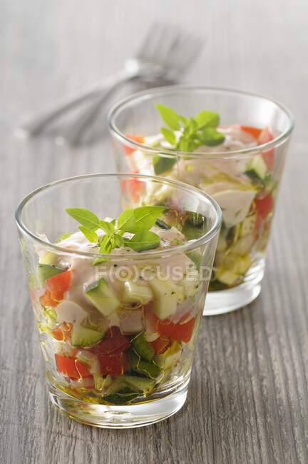 Tomato espuma with vegetables in a glass — Stock Photo