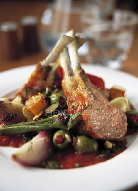 Neck of lamb with olives — Stock Photo