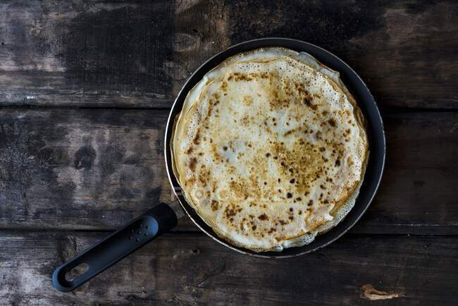 Crepes in a pan — Stock Photo