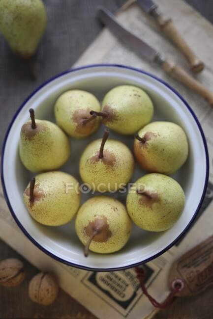 Pears in a metal bowl close-up view — Stock Photo