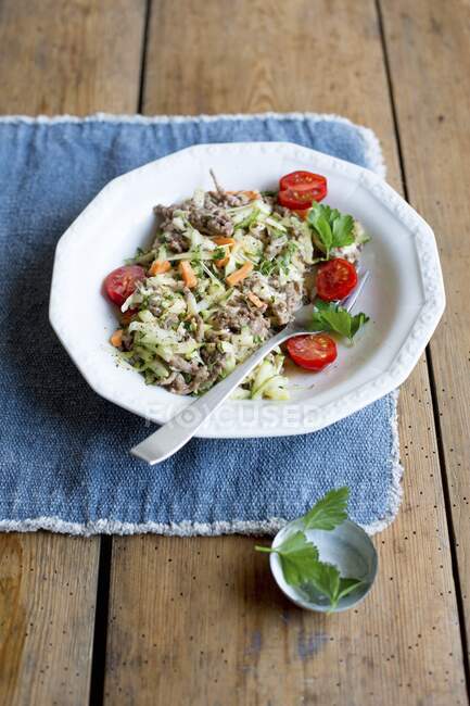 Courgette and mince with cherry tomatoes — Stock Photo