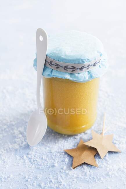 Lemon curd in a glass jar as a gift — Stock Photo