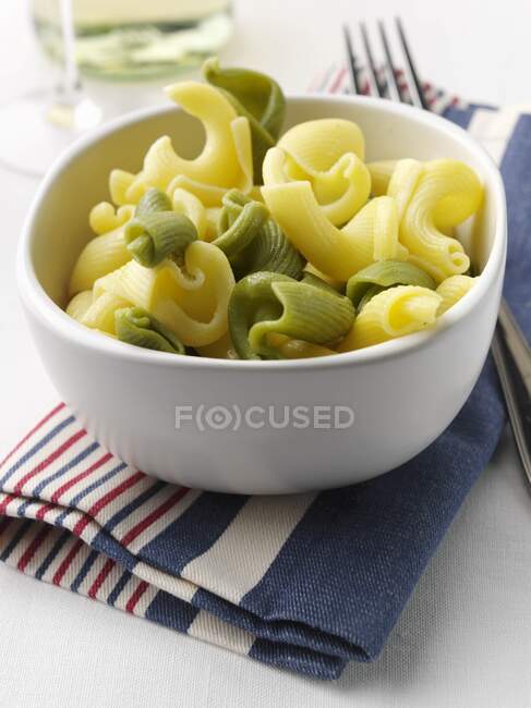 A bowl of torchietti pasta — Stock Photo