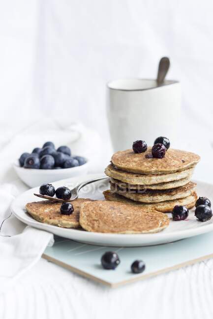 Healthy pancakes with bananas, chia and blueberries — Stock Photo