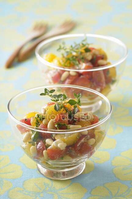 Tomato verrine with goat's cheese and pine nuts — Stock Photo