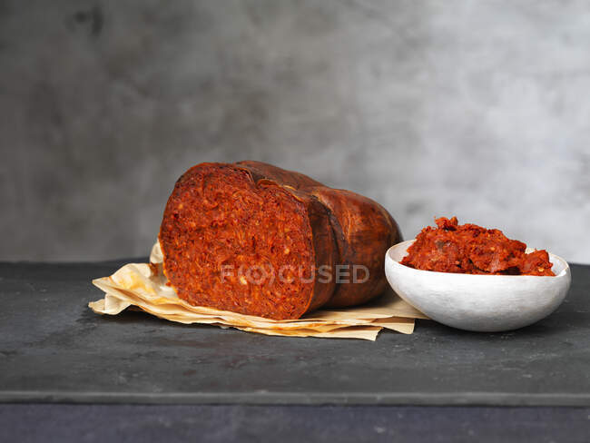 Red chili pepper on a wooden background — Stock Photo