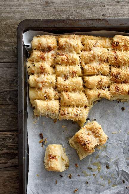 Pizza pull apart bread on a baking sheet — Foto stock