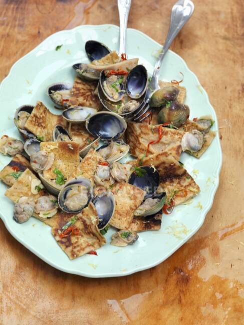 Testaroli with mussels (Italy) — стокове фото