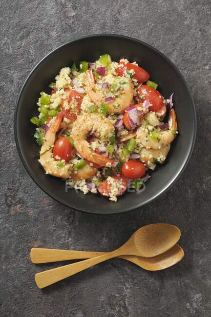 Couscous with shrimp and tomatoes — Stock Photo