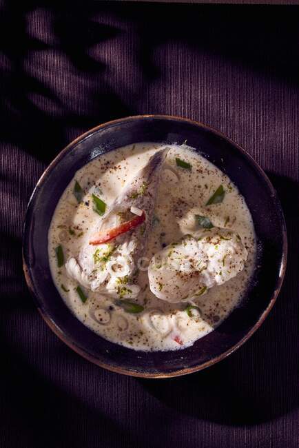 Monkfish in a lime and coconut sauce — Stock Photo